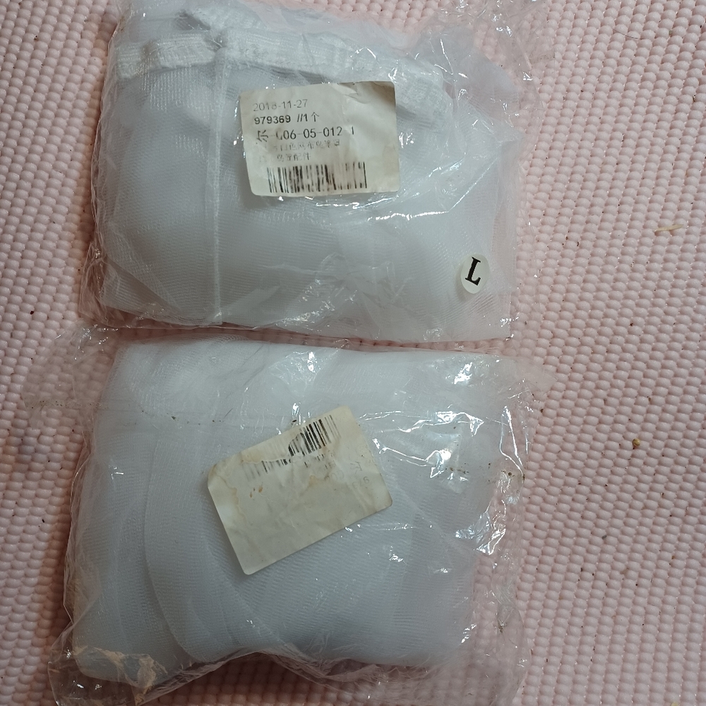 Two large bird cage seed guards,  unopened. Never used.